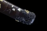Premium Tanto handle pommel detail, showcasing exquisite golden ornament.