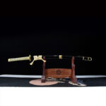 Half-Tachi, complete display with wooden stand, black scabbard with golden accents, beige wrapped handle, collectible samurai sword