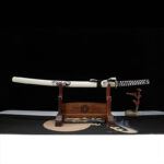 Mermaid Sword, complete display with wooden stand, white scabbard with black patterns, black and white wrapped handle, traditional collectible sword