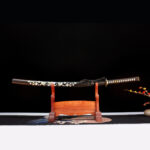Flower Phantom Blade Katana, complete display with wooden stand, black scabbard with floral pattern, intricate handle, collectible samurai sword