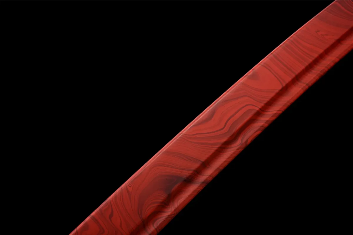 red Plastic Training Knife mid-blade swirl pattern detail on red plastic, training samurai sword, plastic training sword