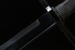 Messer Broadsword blade and guard joint, displaying secure craftsmanship and blackened finish