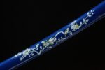 Snow Lotus Warrior scabbard detail, blue base with white lotus or cloud pattern, elegant and unique.