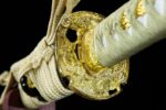 Half-Tachi handle and Tsuba guard overall view, gold Tsuba perfectly integrated with wrapping, harmonious design.