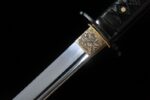 Shadow Ninja Straight Blade, close-up of the blade base and engraved golden fittings, showcasing the seamless connection between the blade, guard, and handle, emphasizing exquisite craftsmanship.