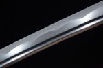 Kill Bill Hattori Hanzo Katana blade detail, reflecting metal, highlighting sword sharpness