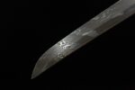 Shogun Tachi sharp blade tip close-up, showcasing its fine polishing and clear cutting angle, reflecting superior performance.