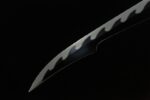 Mermaid Sword blade tip close-up, showcasing wavy hamon and sharp cutting edge