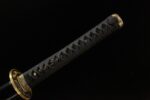 Longyao Kyushu Japanese sword handle overview, showcasing black wrapping and golden embellishments