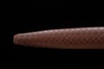 Brown European Sword scabbard end close-up, showing leather embossed texture details