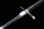 European sword blade-grip junction detail, precise connection, polished steel to hilt, structural integrity.