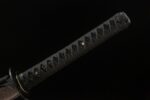 Demon-killing Sword handle full view, black cord tightly wrapped, providing good grip.