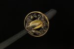 Longyao Kyushu Japanese sword circular tsuba close-up, exquisite openwork carving design