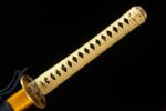 Double Dragon Sword hilt full view, traditional katana handle tightly wrapped in beige cotton ito, complemented by intricate golden fittings, showcasing complete handle details and grip.