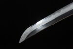 Battle of Shadows Wakizashi blade tip, showcasing sharp cutting edge and exquisite craftsmanship