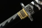 Mermaid Sword tsuba and handle joint, black guard with golden floral pattern