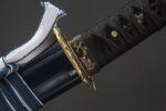 Dawnbringer handle wrapping detail, brown material with woven texture