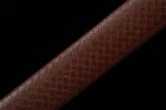 Wind Messenger sword scabbard, close-up of brown woven texture mid-section, highlighting fine craftsmanship and protective design.