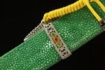 Daming Imperial Sword scabbard mid-section, green texture, yellow tassel, showing the material