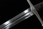 Knight Sword guard and blade, clean transition, sturdy metalwork, combat readiness.