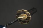 Dawnbringer hilt and guard connection, beast head design with wrapping texture