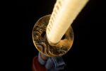 Double Dragon Sword handle and Tsuba (guard) overall view, gold wrapping harmonizing with Tsuba design, comfortable grip.