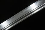 Daming Imperial Sword blade edge, sharp cutting surface, showcasing forging technique