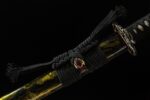 Toyama Dragon Sword, scabbard, black cord, brown bead, golden pattern, traditional craftsmanship, weapon accessory display