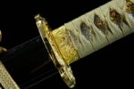 Half-Tachi handle white wrapping close-up, showing tight braiding and texture, providing comfortable grip.