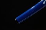 Snow Lotus Warrior scabbard bottom end close-up, showcasing its smooth blue lacquer finish and finishing details.