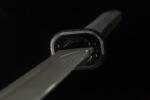 Bass Desert Judge guard and ricasso junction detail in black molded steel, tactical knife, desert hunting knife
