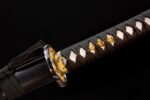 Flower Phantom Blade Katana tsuba and handle joint, golden floral guard with brown wrapping