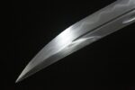 Daming Imperial Sword blade tip, sharp point, precise piercing, showcasing excellent forging craftsmanship