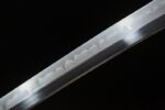 Yulong Japanese Sword blade mid-section detail, showing metallic luster and forging texture, reflecting craftsmanship quality.