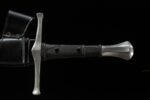 Knight sword, full view of black grip with silver guard and pommel, showing comfortable handling and classic design.