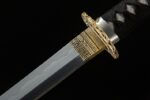 Red Flame Dragon Soul Katana handle and guard, gold wrap, intricate design, secure grip.