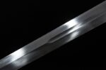 Knight Sword blade polish, reflective surface, sharp edge, functional design.