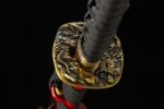 Dragon Slayer Sword tsuba and handle joint, golden and black contrast