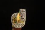 Daming Imperial Sword hilt end, metal decoration, jewel accents, intricate design