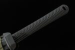 Bass Desert Judge handle close-up showing herringbone rubber grip texture, tactical knife, desert hunting knife