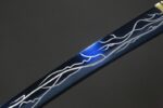 Dawnbringer blade section, flowing blue light and delicate engravings