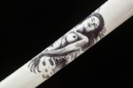 Mermaid Sword scabbard mid-section close-up, showcasing detailed mermaid drawing and light-colored scabbard surface