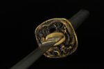 Dragon Slayer Sword golden dragon motif tsuba front close-up
