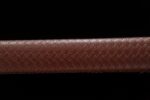 Brown European Sword scabbard mid-section close-up, showcasing fine leather embossed texture