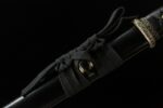 Night Blade sword, close-up of black smooth scabbard mid-section with cord wrapping, showcasing secure and decorative design.