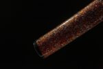 Emperor's Golden Blade scabbard partial view, red textured pattern, showcasing unique shark or ray skin texture