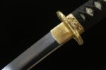 Emperor's Golden Blade handle and golden tsuba connection detail, showcasing fine fitting craftsmanship.