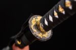 Flower Phantom Blade Katana circular tsuba detail, exquisite openwork floral pattern and golden texture