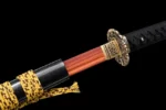 Tang Bohu Dian Qiuxiang scabbard mouth (koiguchi) and fuchi collar detail in orange lacquer and brass, training samurai sword, wooden samurai sword