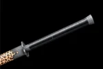 Wooden Embroidered Spring Knife black tsuka-ito wrap over natural samegawa handle texture, training samurai sword, wooden samurai sword